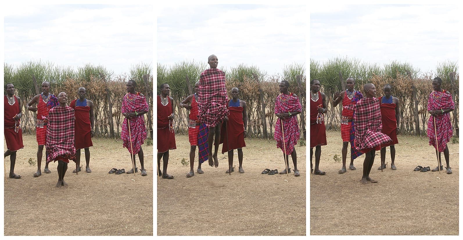 Maasai men mid-jump in the adumu dance